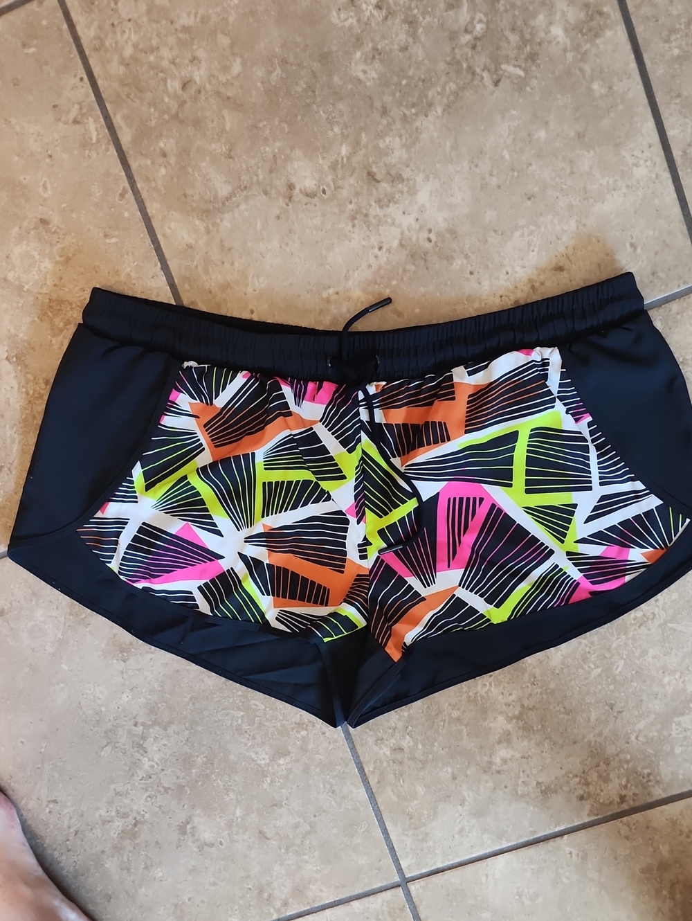 Fabletics Black Athletic Shorts with Neon Pink Orange and Lime Geometric Print